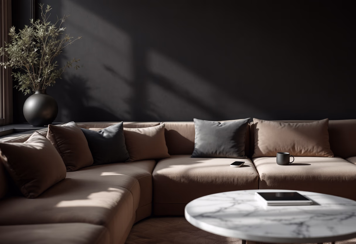 Sofa with a cup on it and a table having a tablet over it